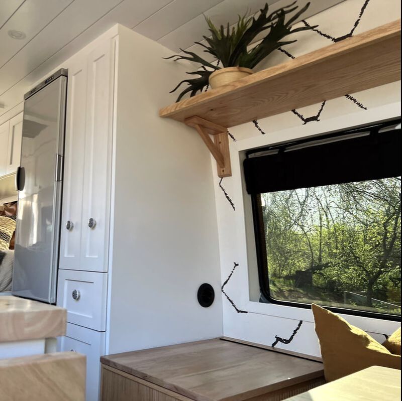Custom sprinter camper van with amazing cabinet organization and pullouts